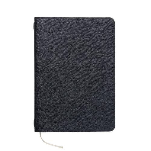 The Pensift leather cover in black Epsom-grain leather, front-on, with the beige ribbon.