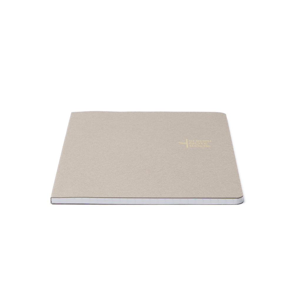 The official B6 Notebook Refill for the Pensift Notebook, showing its slim 80-page profile and a minimalist light grey cover.