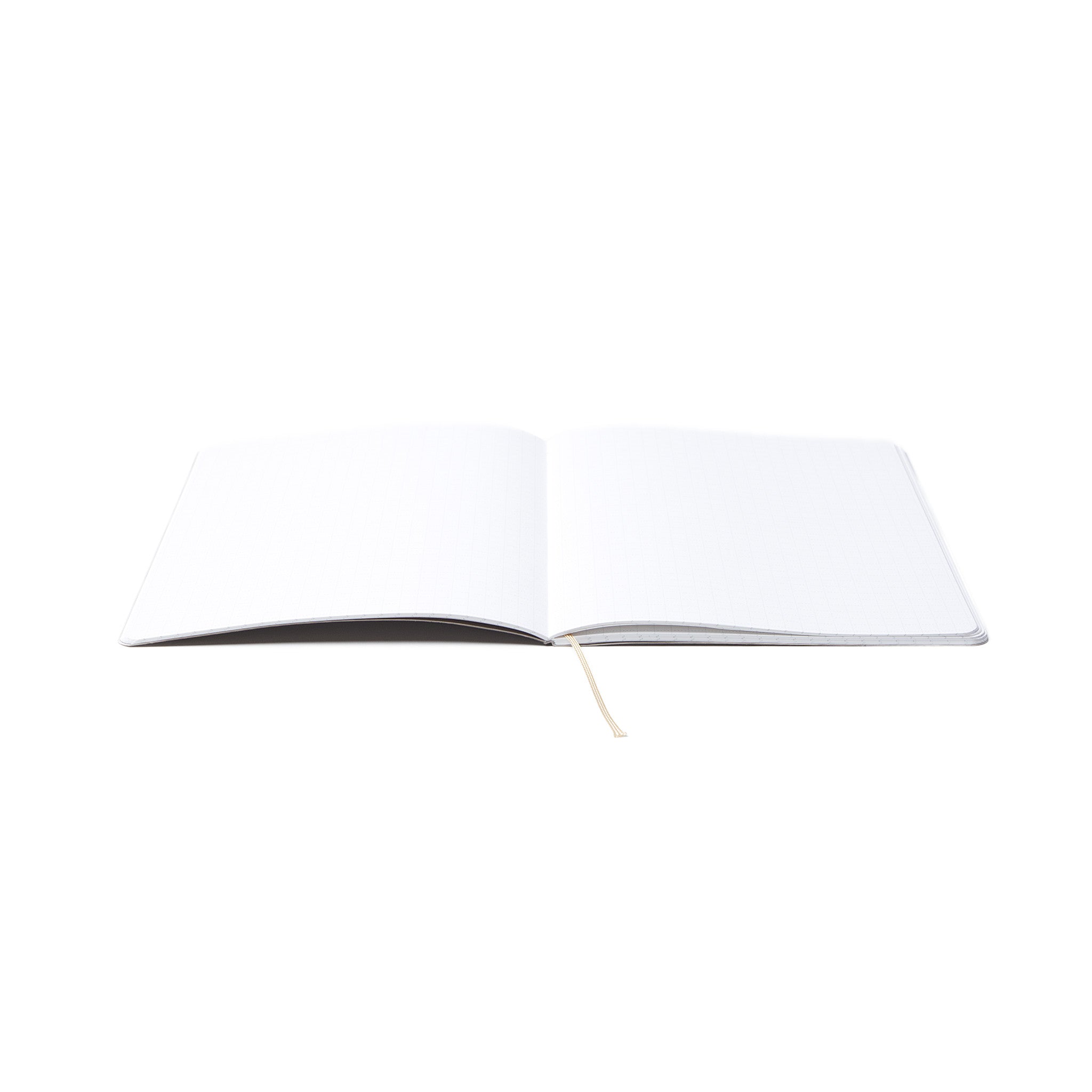 An open Pensift Notebook Refill demonstrating its thread-sewn lay-flat binding, revealing the 5 mm dot grid pages and the built-in ribbon bookmark.