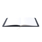 The Executive Sketchbook open flat on desk showing lay-flat binding