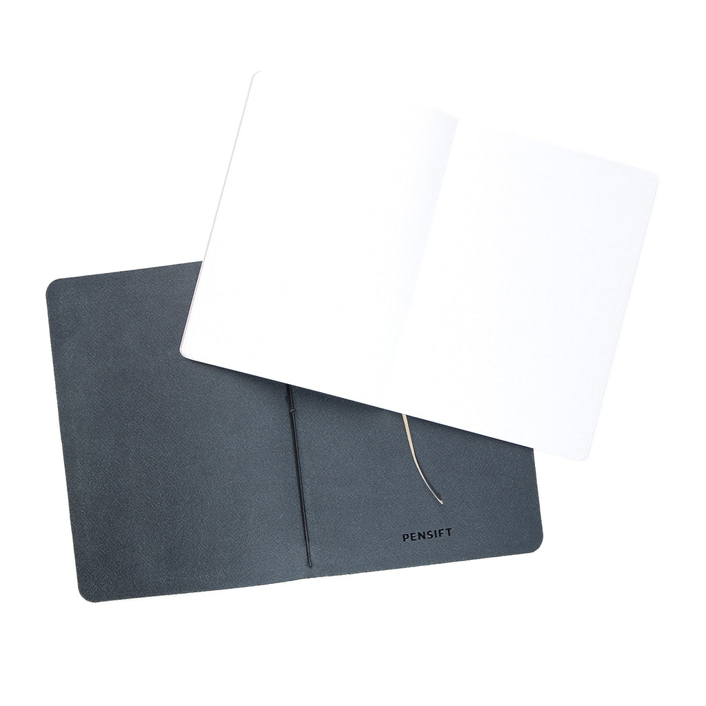 How the Executive Sketchbook refill system works - slide out old B6 notebook, slide in new refill with elastic loop closure